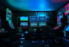 Arcade games in a dark room.